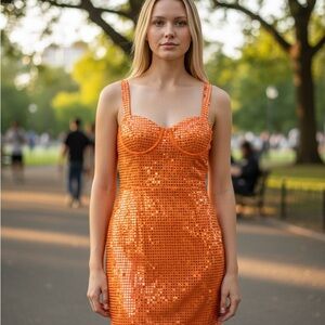 Live The Life Of A Showgirl In This Orange Sequin Dress